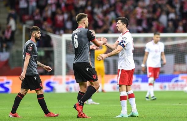 Berat Djimsiti of Albania reacts Robert Lewandowski of Poland during the 2022 FIFA World Cup Qualifier match between Poland and Albania at National...