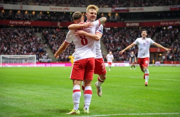 Karol Linetty and Kamil Jozwiak of Poland celebrates scoring the goal with during the 2022 FIFA World Cup Qualifier match between Poland and Albania...