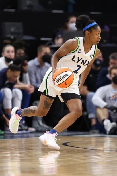 Crystal Dangerfield of the Minnesota Lynx dribbles the ball during the game against the Los Angeles Sparks on September 2, 2021 at Target Center in...
