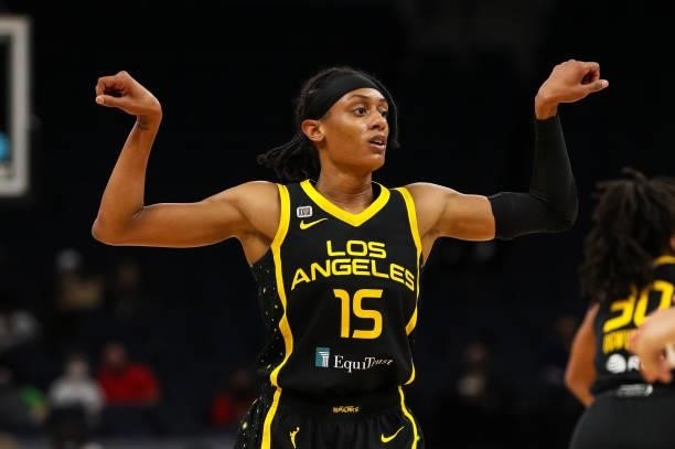 Brittney Sykes celebrates after Nneka Ogwumike of the Los Angeles Sparks made a two point shot against the Minnesota Lynx in the first half of the...