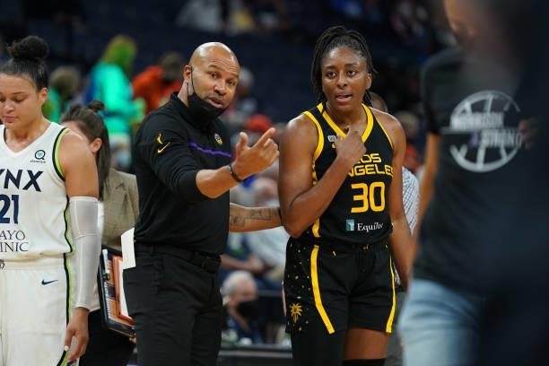 Head Coach Derek Fisher of the Los Angeles Sparks talks with Nneka Ogwumike during the game against the Minnesota Lynx on September 2, 2021 at Target...