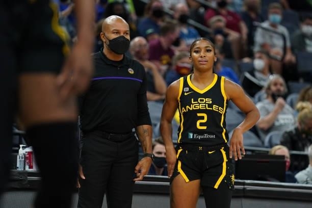Head Coach Derek Fisher of the Los Angeles Sparks and Te'a Cooper look on during the game against the Minnesota Lynx on September 2, 2021 at Target...