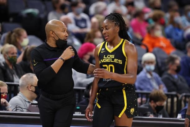 Head Coach Derek Fisher of the Los Angeles Sparks talks with Nneka Ogwumike during the game against the Minnesota Lynx on September 2, 2021 at Target...