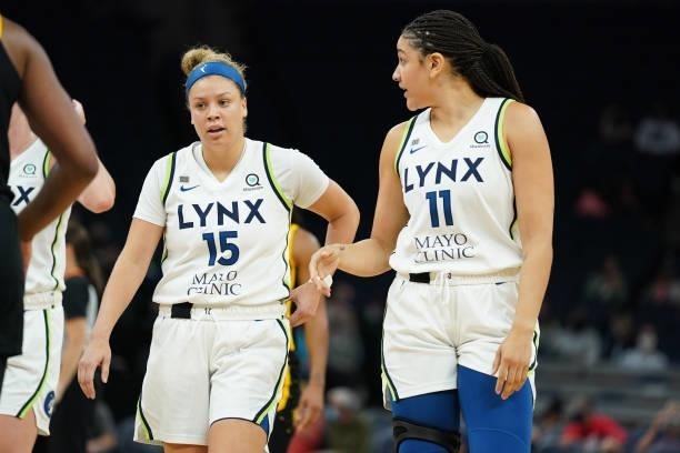 Rachel Banham and Natalie Achonwa of the Minnesota Lynx talk during the game against the Los Angeles Sparks on September 2, 2021 at Target Center in...