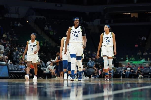 Crystal Dangerfield, Sylvia Fowles and Napheesa Collier of the Minnesota Lynx look on during the game against the Los Angeles Sparks on September 2,...