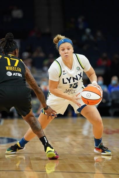 Rachel Banham of the Minnesota Lynx dribbles the ball during the game against the Los Angeles Sparks on September 2, 2021 at Target Center in...