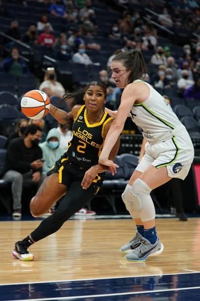 Te'a Cooper of the Los Angeles Sparks drives to the basket during the game against the Minnesota Lynx on September 2, 2021 at Target Center in...