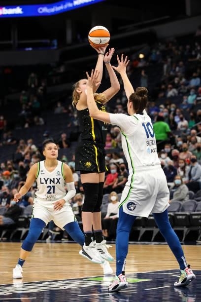 Lauren Cox of the Los Angeles Sparks shoots the ball while Jessica Shepard of the Minnesota Lynx defends in the first half of the game at Target...