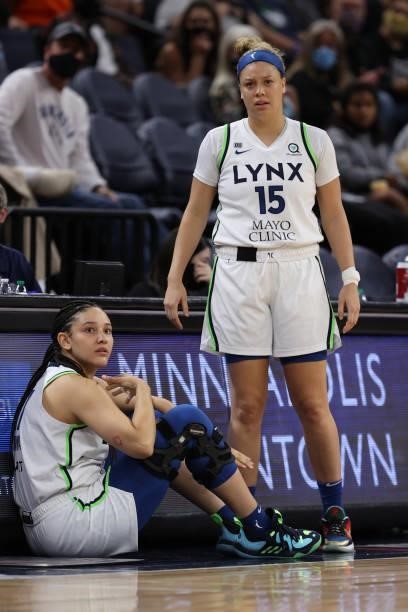 Natalie Achonwa and Rachel Banham of the Minnesota Lynx look on during the game against the Los Angeles Sparks on September 2, 2021 at Target Center...