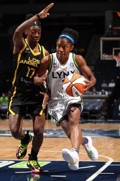 Crystal Dangerfield of the Minnesota Lynx drives to the basket during the game against the Los Angeles Sparks on September 2, 2021 at Target Center...
