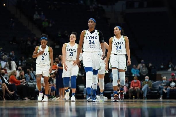 Crystal Dangerfield, Kayla McBride, Sylvia Fowles, Napheesa Collier of the Minnesota Lynx look on during the game against the Los Angeles Sparks on...