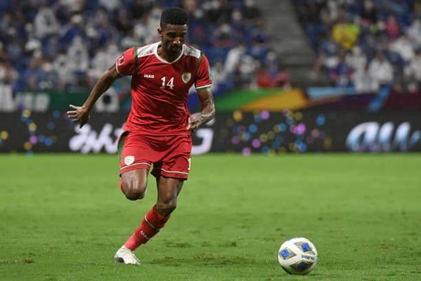 Amjad Al Harthi of Oman dribbles the ball during FIFA World Cup Asian Qualifier Final Round Group B match between Japan and Oman at Panasonic Stadium...