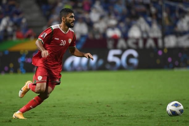 Sallah Said Al Yahyaei of Oman dribbles the ball during FIFA World Cup Asian Qualifier Final Round Group B match between Japan and Oman at Panasonic...