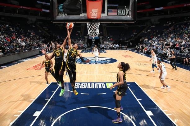 Nneka Ogwumike and Brittney Sykes of the Los Angeles Sparks rebound the ball during the game against the Minnesota Lynx on September 2, 2021 at...