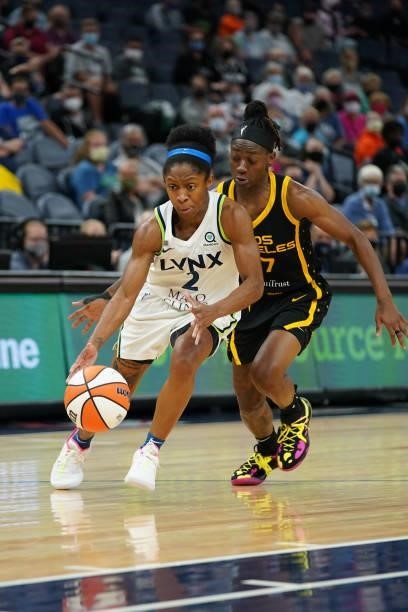 Crystal Dangerfield of the Minnesota Lynx dribbles the ball during the game against the Los Angeles Sparks on September 2, 2021 at Target Center in...