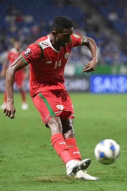 Amjad Al Kharthi of Oman crosses the ball during FIFA World Cup Asian Qualifier Final Round Group B match between Japan and Oman at Panasonic Stadium...