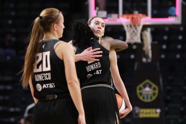 Breanna Stewart of the Seattle Storm hugs Natasha Howard of the New York Liberty after the game on September 2, 2021 at the Angel of the Winds Arena,...