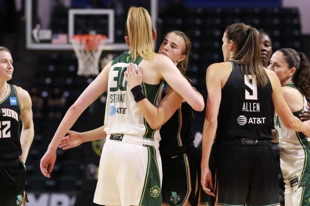 Sabrina Ionescu of the New York Liberty hugs Breanna Stewart of the Seattle Storm after the game on September 2, 2021 at the Angel of the Winds...