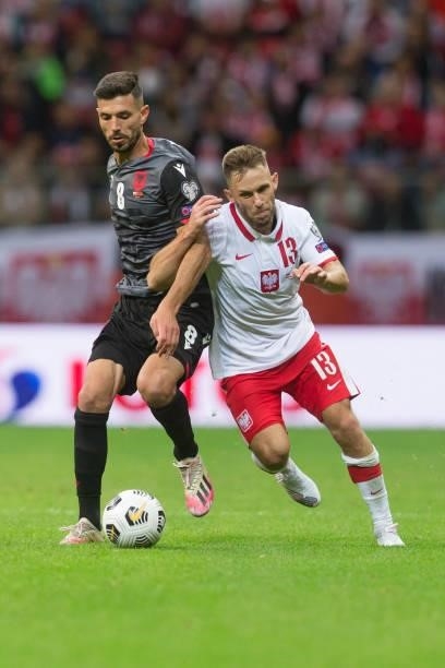 Klaus Gjasula ,Maciej Rybus during the World Cup 2020 qualifier match between Poland v Albania, in Warsaw, Poland, on September 2, 2021.
