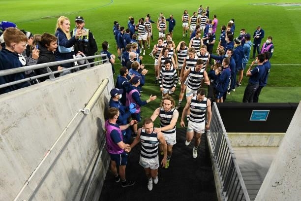 Joel Selwood of the Cats leads the team into the rooms after the win during the 2021 AFL Second Semi Final match between the Geelong Cats and the GWS...