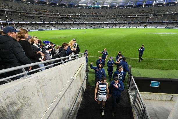 Chris Scott, Senior Coach of the Cats heads to the rooms after the win during the 2021 AFL Second Semi Final match between the Geelong Cats and the...