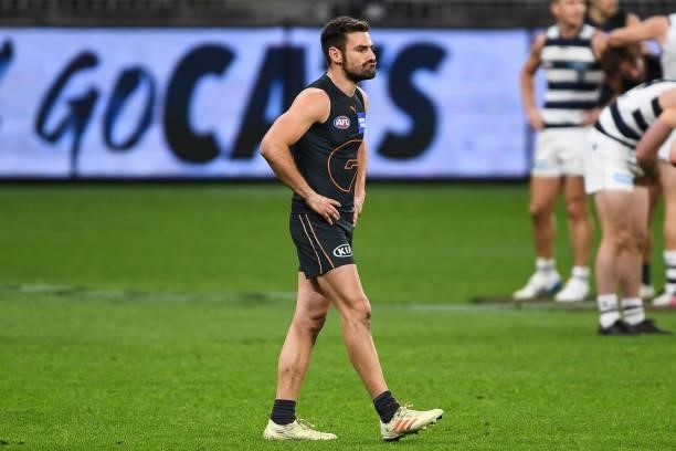 Stephen Coniglio of the Giants looks dejected after a loss during the 2021 AFL Second Semi Final match between the Geelong Cats and the GWS Giants at...