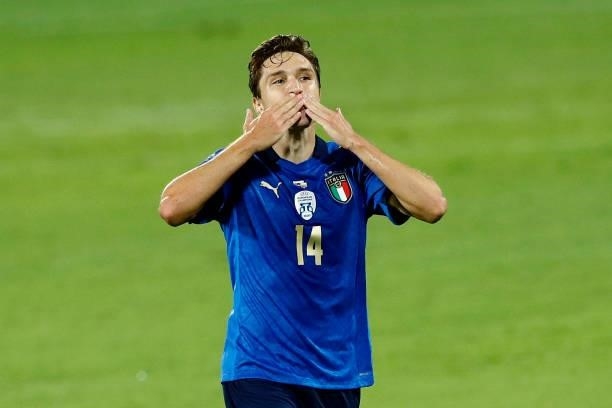 Federico Chiesa of Italy celebrates after scoring his team's first goal during the 2022 FIFA World Cup Qualifier Group C match between Italy and...