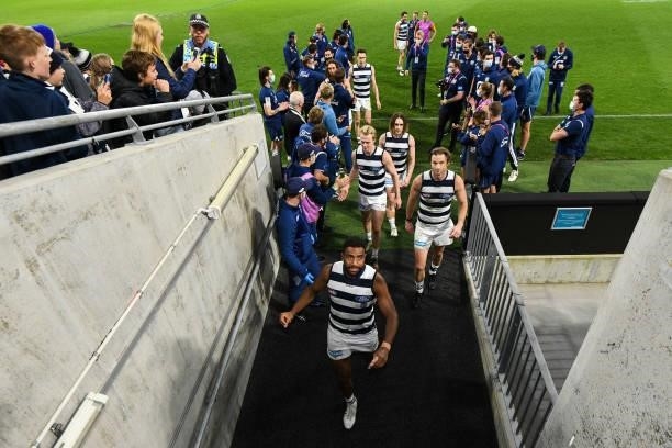 The Cats head to the rooms after the win during the 2021 AFL Second Semi Final match between the Geelong Cats and the GWS Giants at Optus Stadium on...