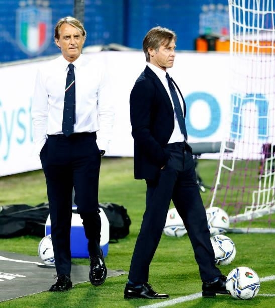 Head coach Roberto Mancini of Italy and Team Manager Lele Oriali of Italy look on prior to the 2022 FIFA World Cup Qualifier Group C match between...