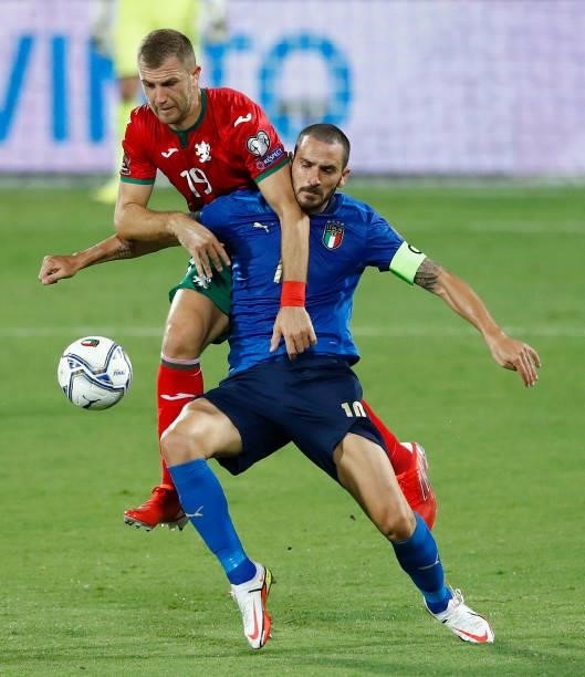 Atanas Iliev of Bulgaria and Leonardo Bonucci of Italy battle for the ball during the 2022 FIFA World Cup Qualifier Group C match between Italy and...