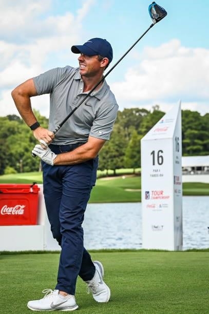 Rory McIlroy of Northern Ireland reacts to his shot from the 16th tee during the first round of the TOUR Championship, the final event of the...