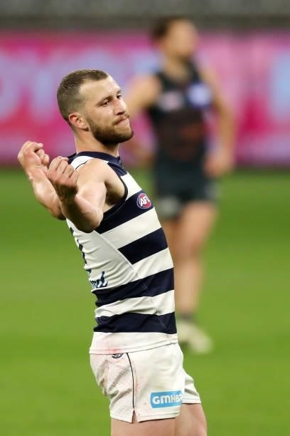 Sam Menegola of the Cats celebrates after scoring a goal during the 2021 AFL Second Semi Final match between the Geelong Cats and the GWS Giants at...