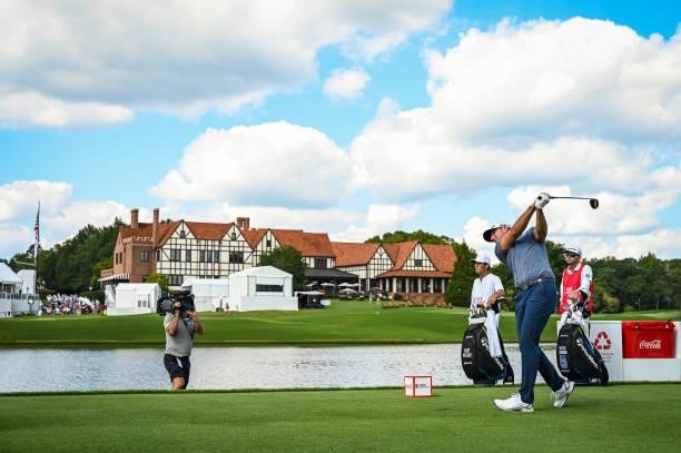 Dustin Johnson plays his shot from the 16th tee during the first round of the TOUR Championship, the final event of the FedExCup Playoffs, at East...