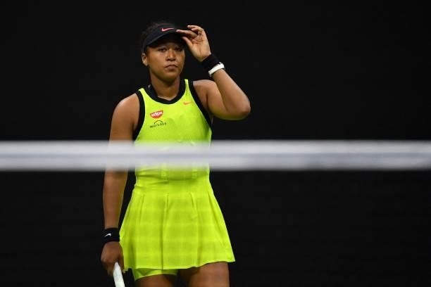 Japan's Naomi Osaka reacts during her 2021 US Open Tennis tournament women's singles third round match against Canada's Leylah Fernandez at the USTA...