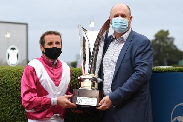 Damien Oliver with Danny O'Brien after Superstorm won the Clamms Seafood Feehan Stakes, at Moonee Valley Racecourse on September 04, 2021 in Moonee...