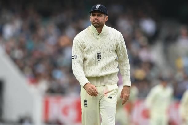 England's James Anderson reacts as India bat on during play on the third day of the fourth cricket Test match between England and India at the Oval...