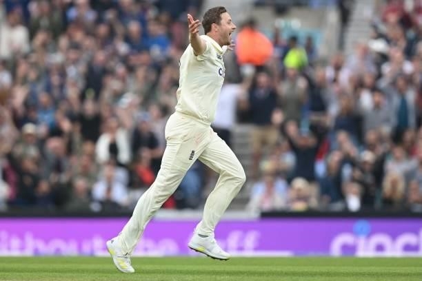 England's Ollie Robinson celebrates taking the wicket of India's Cheteshwar Pujara during play on the third day of the fourth cricket Test match...