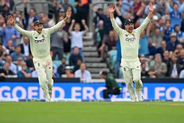 England's captain Joe Root and England's Rory Burns appeal unsuccessfully during play on the third day of the fourth cricket Test match between...