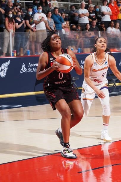 Kelsey Mitchell of the Indiana Fever drives to the basket during the game against the Phoenix Mercury on September 4, 2021 at the Indiana Farmers...