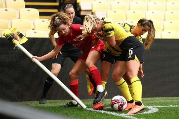 Leanne Kiernan of Liverpool tangles with Rosie Kmita and Anne Meiwald of Watford during the Barclays FA Women's Championship between Watford Ladies...