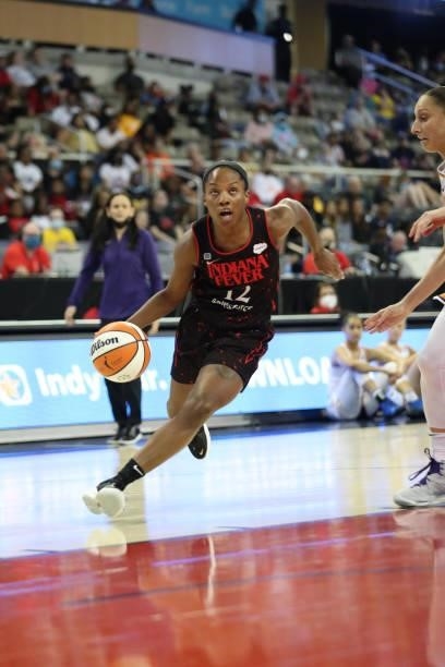Lindsay Allen of the Indiana Fever drives to the basket against the Phoenix Mercury on September 4, 2021 at the Indiana Farmers Coliseum in...