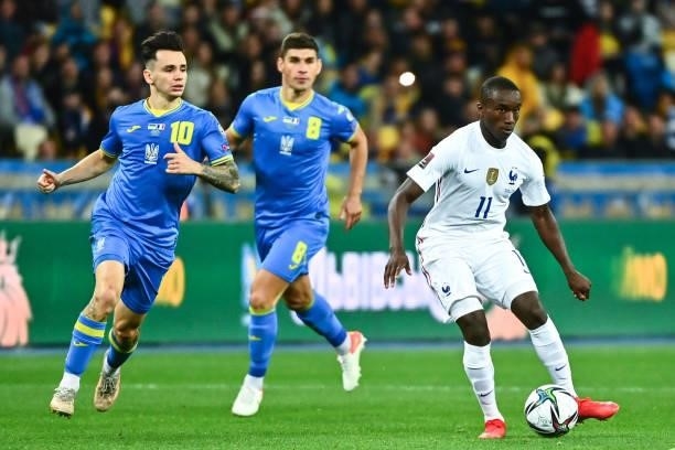 Moussa DIABY of France, Mykola SHAPARENKO of Ukraine and Ruslan MALINOVSKYI of Ukraine during the FIFA World Cup 2022 Qatar qualifying match between...