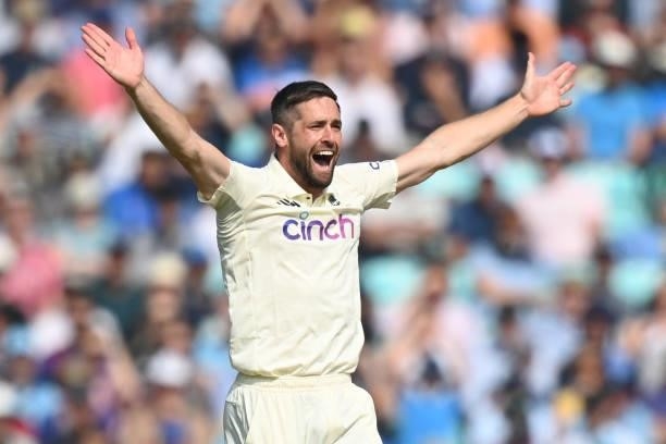 England's Chris Woakes appeals successfully for an LBW decision against India's Ravindra Jadeja during play on the fourth day of the fourth cricket...