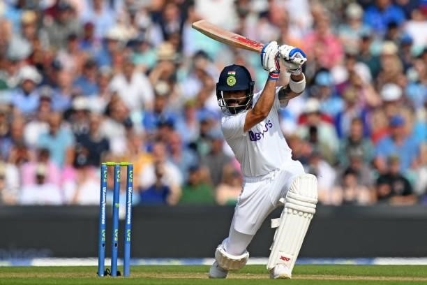 India's captain Virat Kohli hits a boundary off the bowling of England's James Anderson during play on the fourth day of the fourth cricket Test...