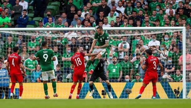 Dublin , Ireland - 4 September 2021; Shane Duffy of Republic of Ireland heads to score his side's first goal during the FIFA World Cup 2022...
