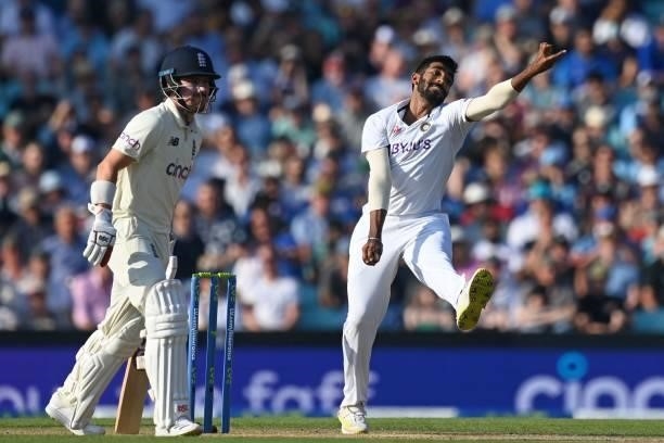 India's Jasprit Bumrah bowls during play on the fourth day of the fourth cricket Test match between England and India at the Oval cricket ground in...