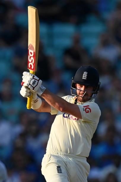 England's Rory Burns plays a shot during play on the fourth day of the fourth cricket Test match between England and India at the Oval cricket ground...