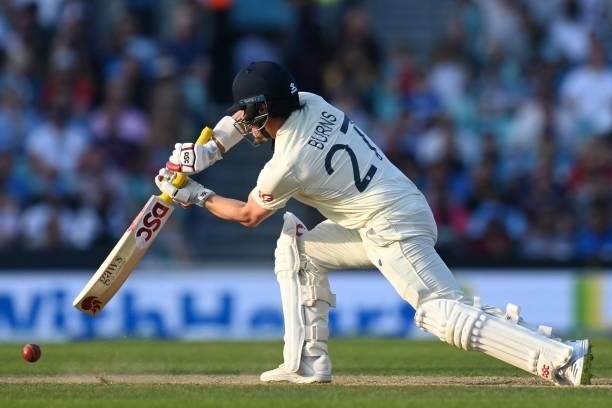 England's Rory Burns plays a shot during play on the fourth day of the fourth cricket Test match between England and India at the Oval cricket ground...