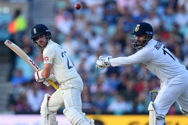 England's Rory Burns plays a shot as India's Rishabh Pant keeps wicket during play on the fourth day of the fourth cricket Test match between England...