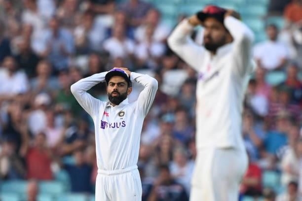 India's captain Virat Kohli reacts in the field during play on the fourth day of the fourth cricket Test match between England and India at the Oval...
